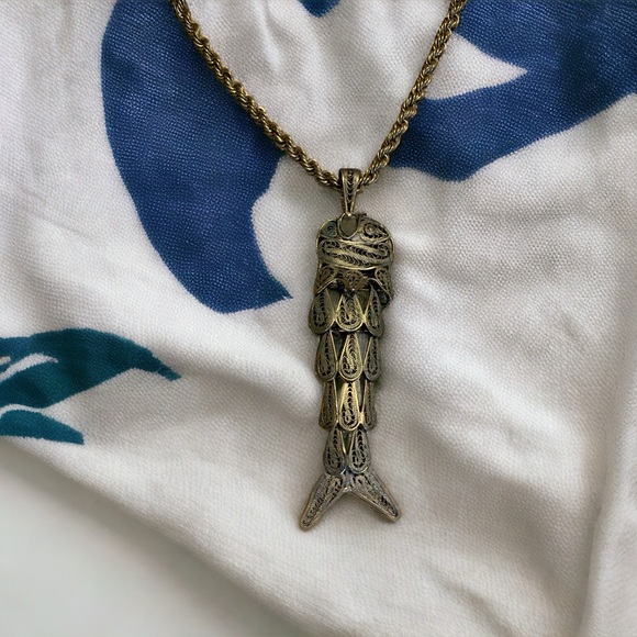 Jewelry - Huge gold plated articulated filigree fish pendant.